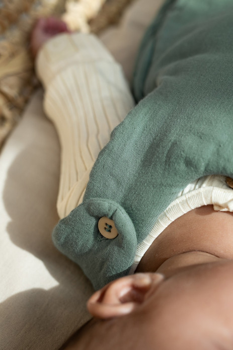 beautiful baby sleep sack with wooden buttons