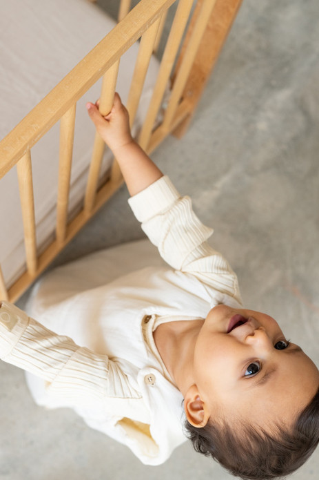 bonito saco de dormir para bebé con botones de madera