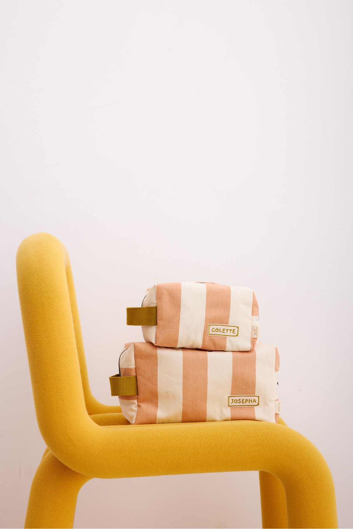 small striped and personalized toiletry bag