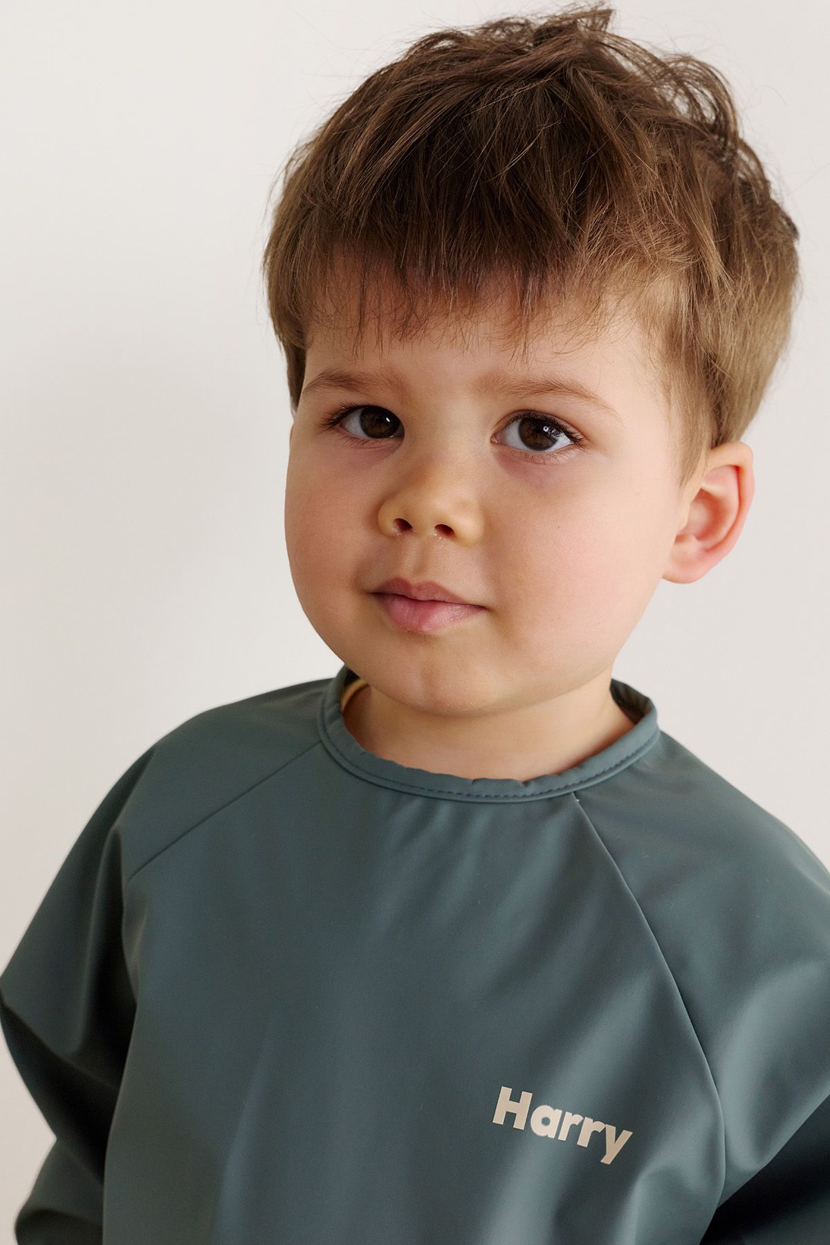 customizable long-sleeve coated bib for baby