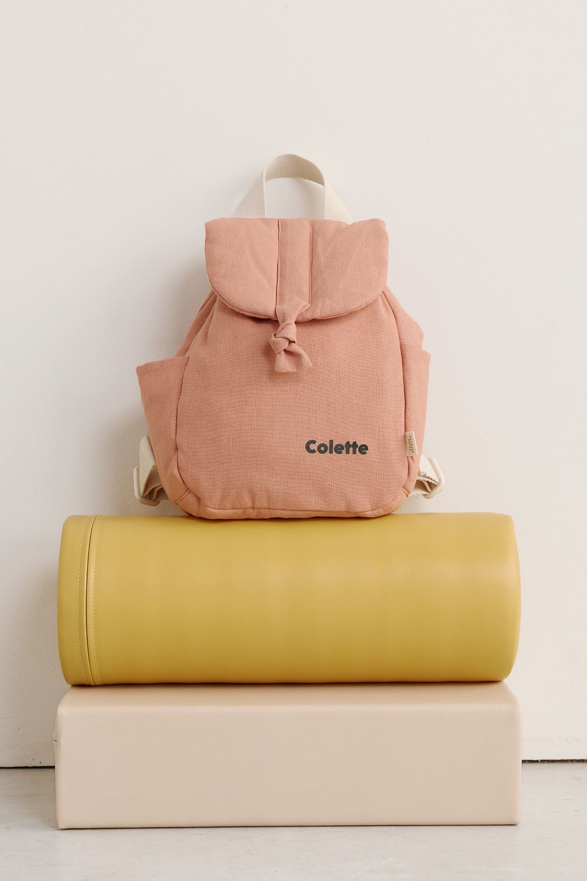 mochila bebé de lino personalizable con asas ajustables