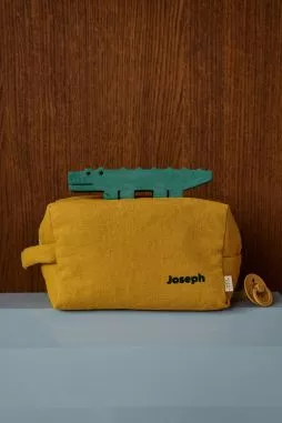 large toiletry bag with personalized interior linen pockets for children and adults