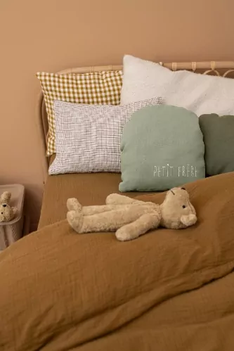 joli coussin uni et ovale à personnaliser